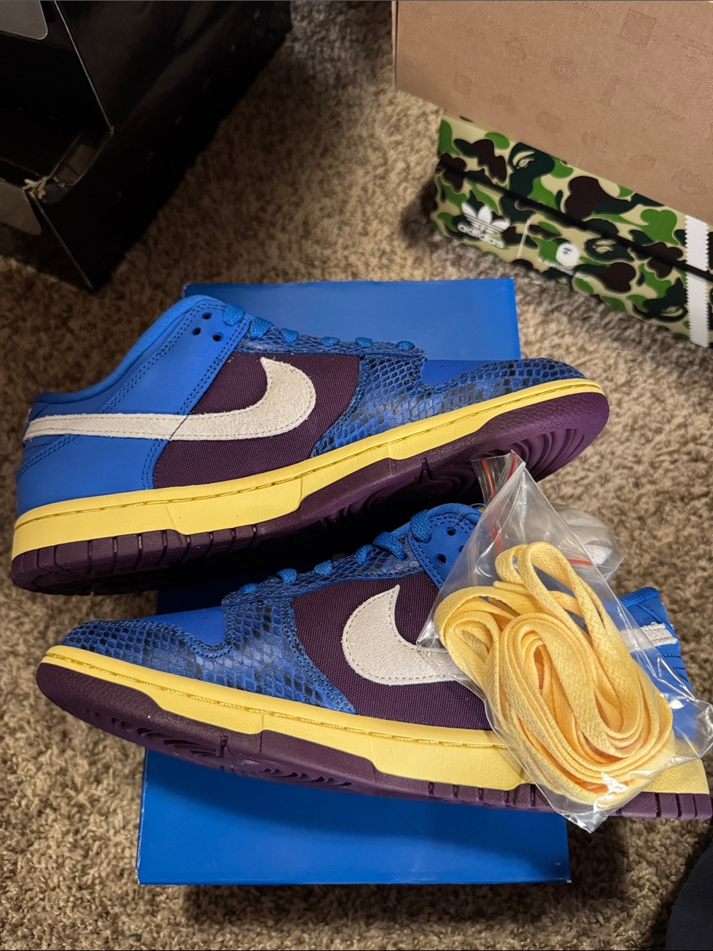 Undefeated Blue Sneakers with Yellow Trim